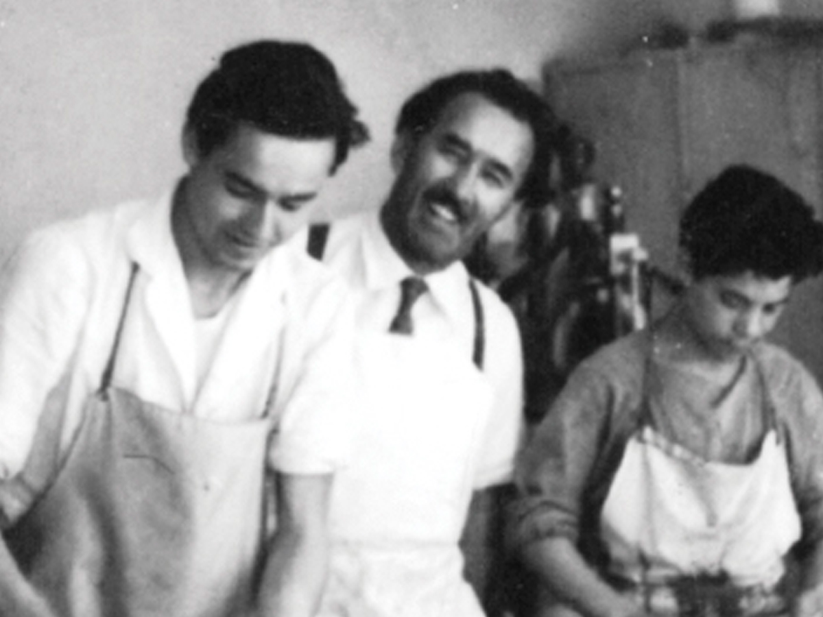 Loacker family old picture with pastry chefs Alfons and Armin in the bakery shop in Bolzano - Loacker
